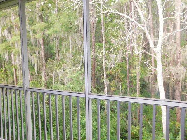a bathroom with a sink a mirror and a shower