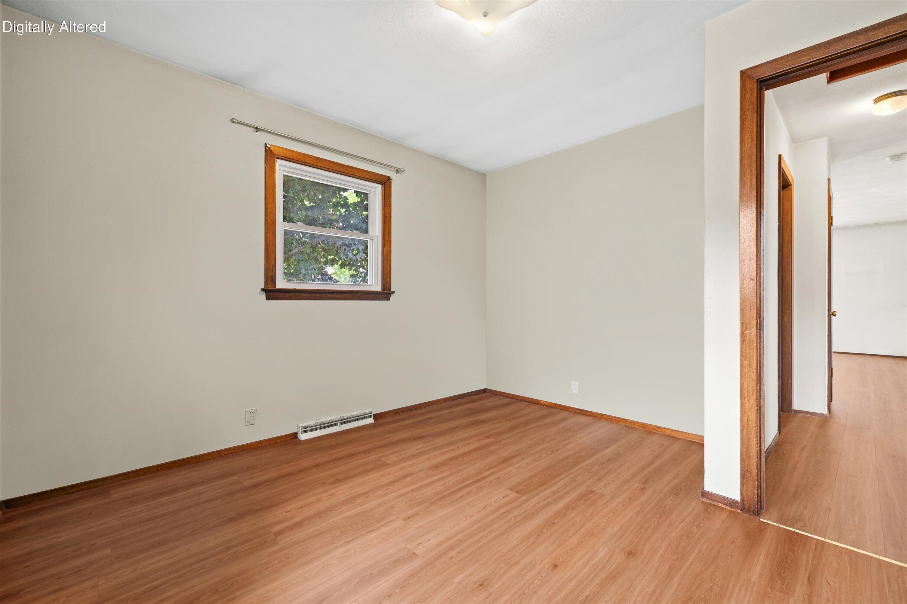 1815 Jupiter Avenue Racine, WI 53404 - Photo 15 of 38 Photos are Digitally Altered to show different flooring in primary bedroom