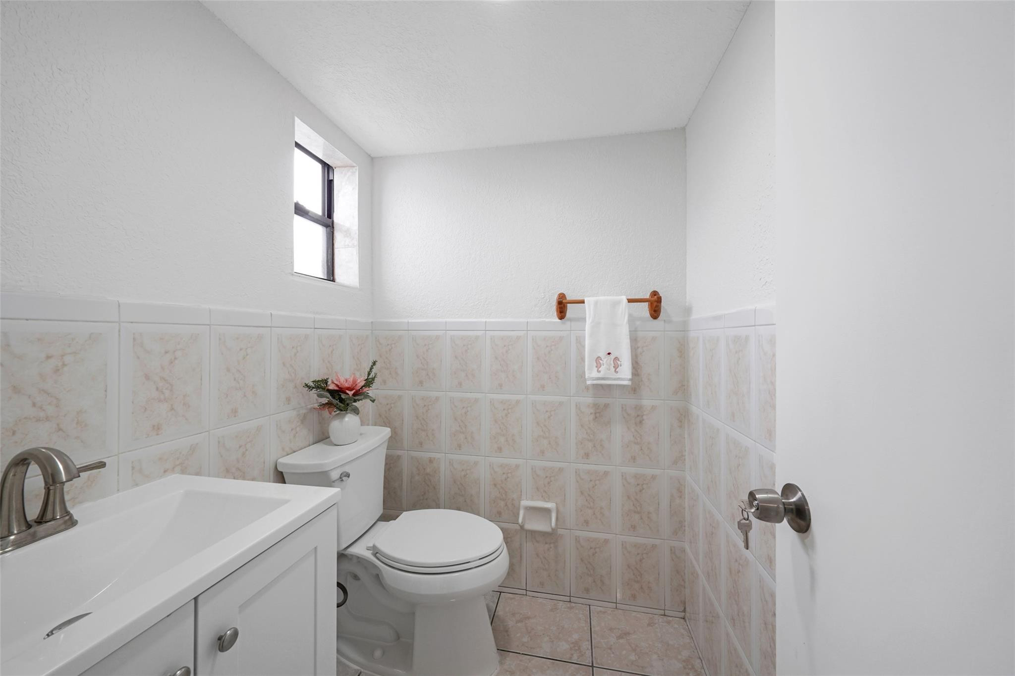 230 West 68th Street, Unit 208 Hialeah, FL 33014 - Photo 11 of 23 a bathroom with a sink a toilet and shower