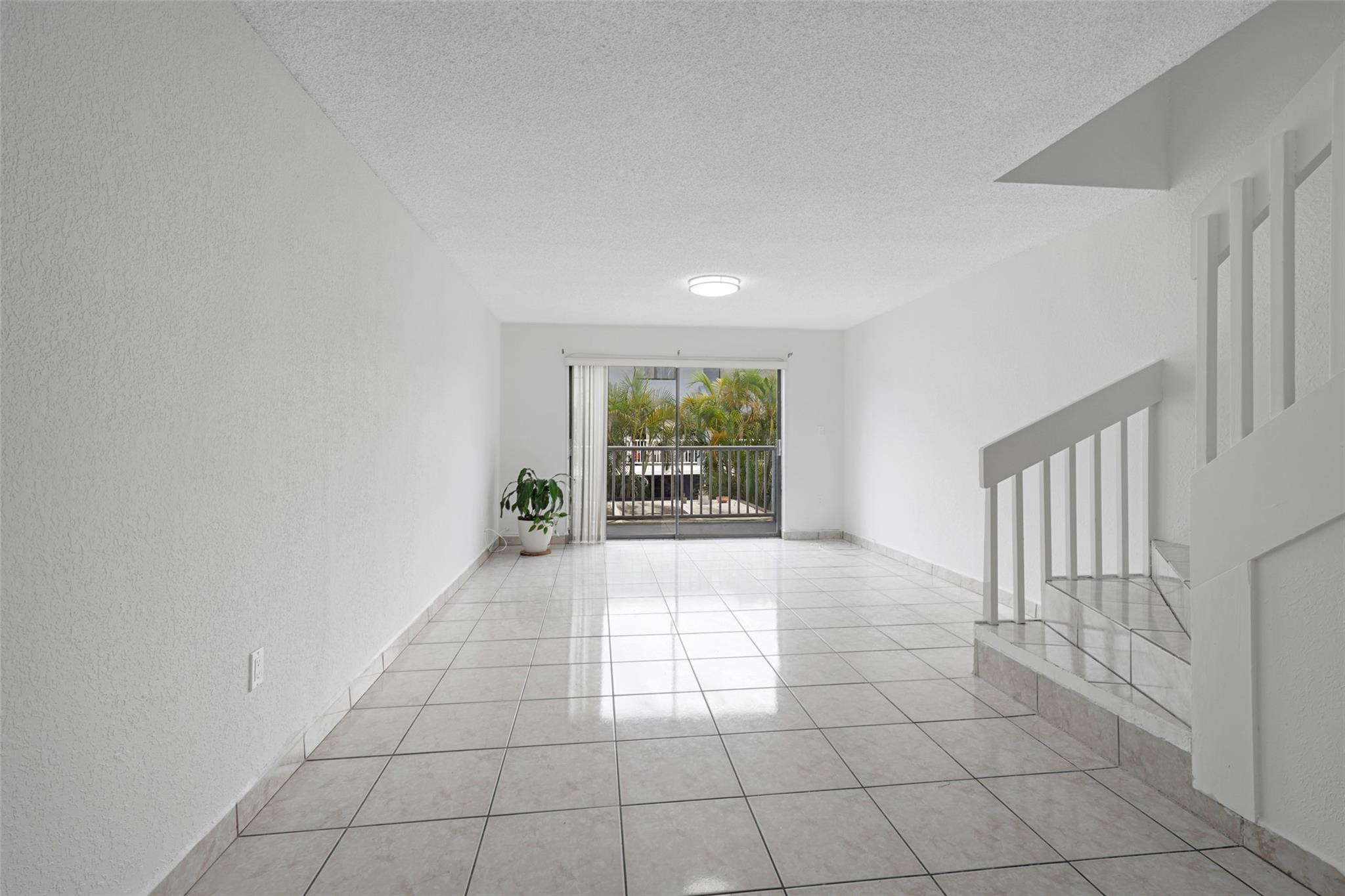 230 West 68th Street, Unit 208 Hialeah, FL 33014 - Photo 13 of 23 a view of an empty room and window