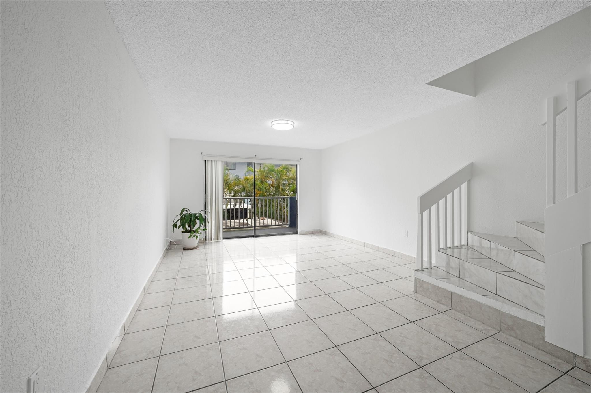 230 West 68th Street, Unit 208 Hialeah, FL 33014 - Photo 16 of 23 a view of an empty room and window