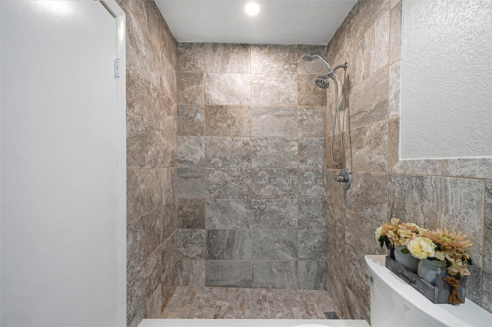 230 West 68th Street, Unit 208 Hialeah, FL 33014 - Photo 18 of 23 a bathroom with a sink toilet and shower