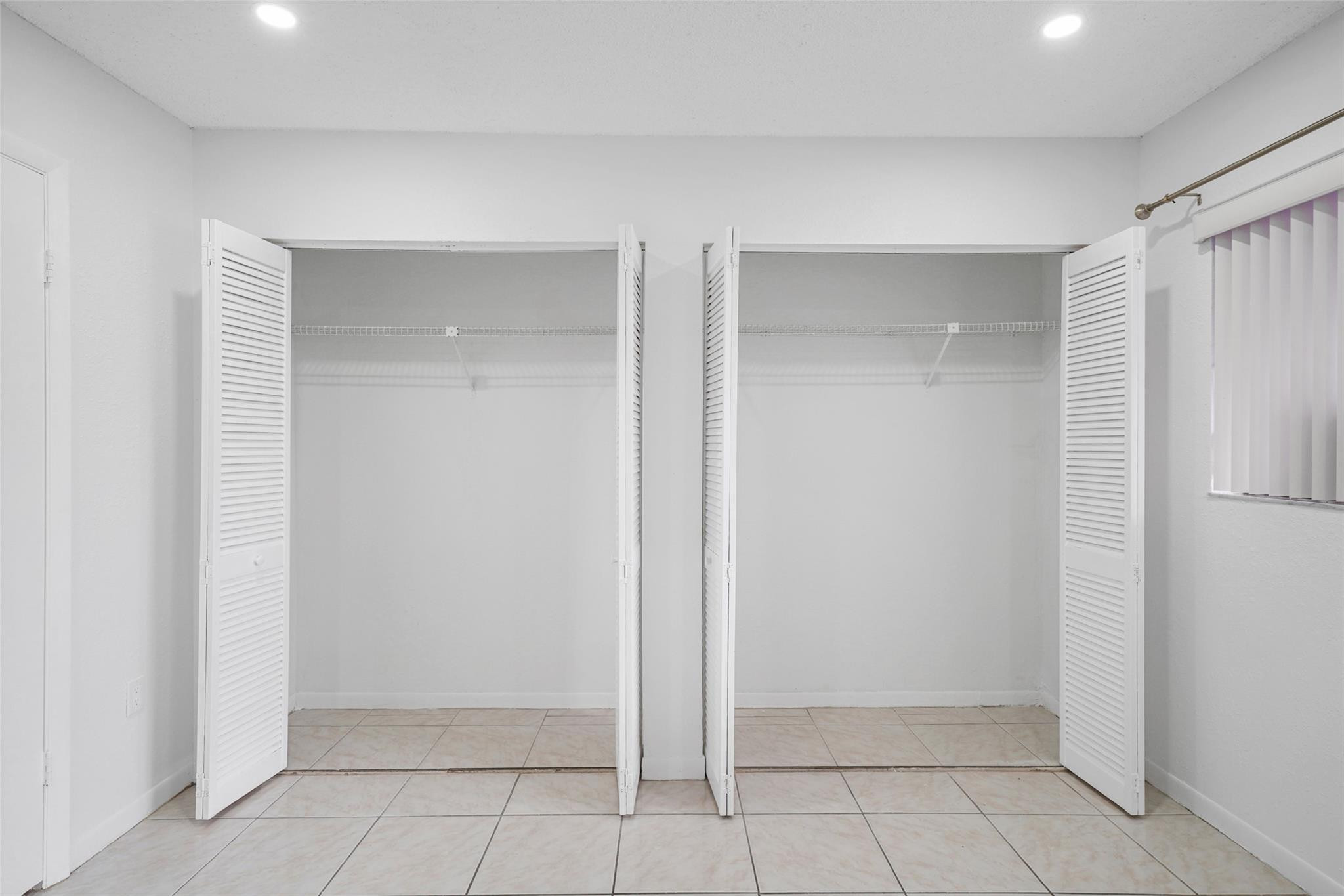 230 West 68th Street, Unit 208 Hialeah, FL 33014 - Photo 22 of 23 a view of an empty room