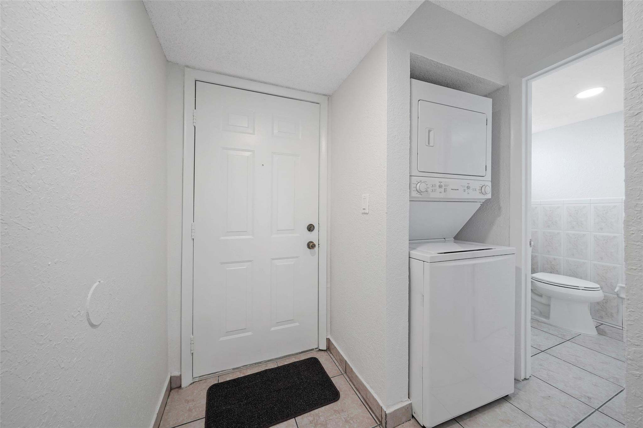 230 West 68th Street, Unit 208 Hialeah, FL 33014 - Photo 10 of 23 a bathroom with a toilet and a shower