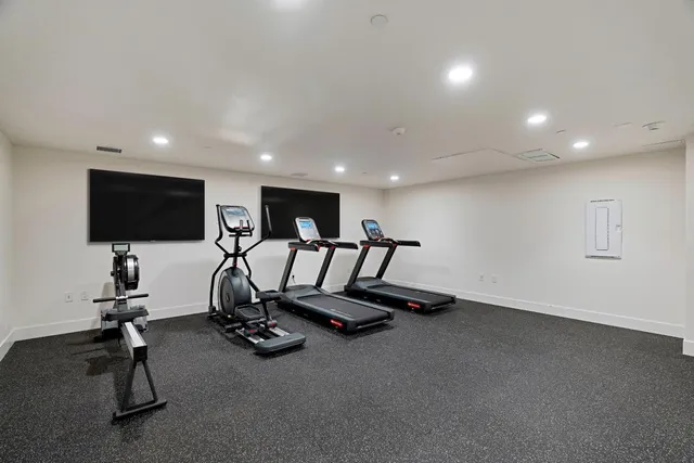 a view of a room with gym equipment
