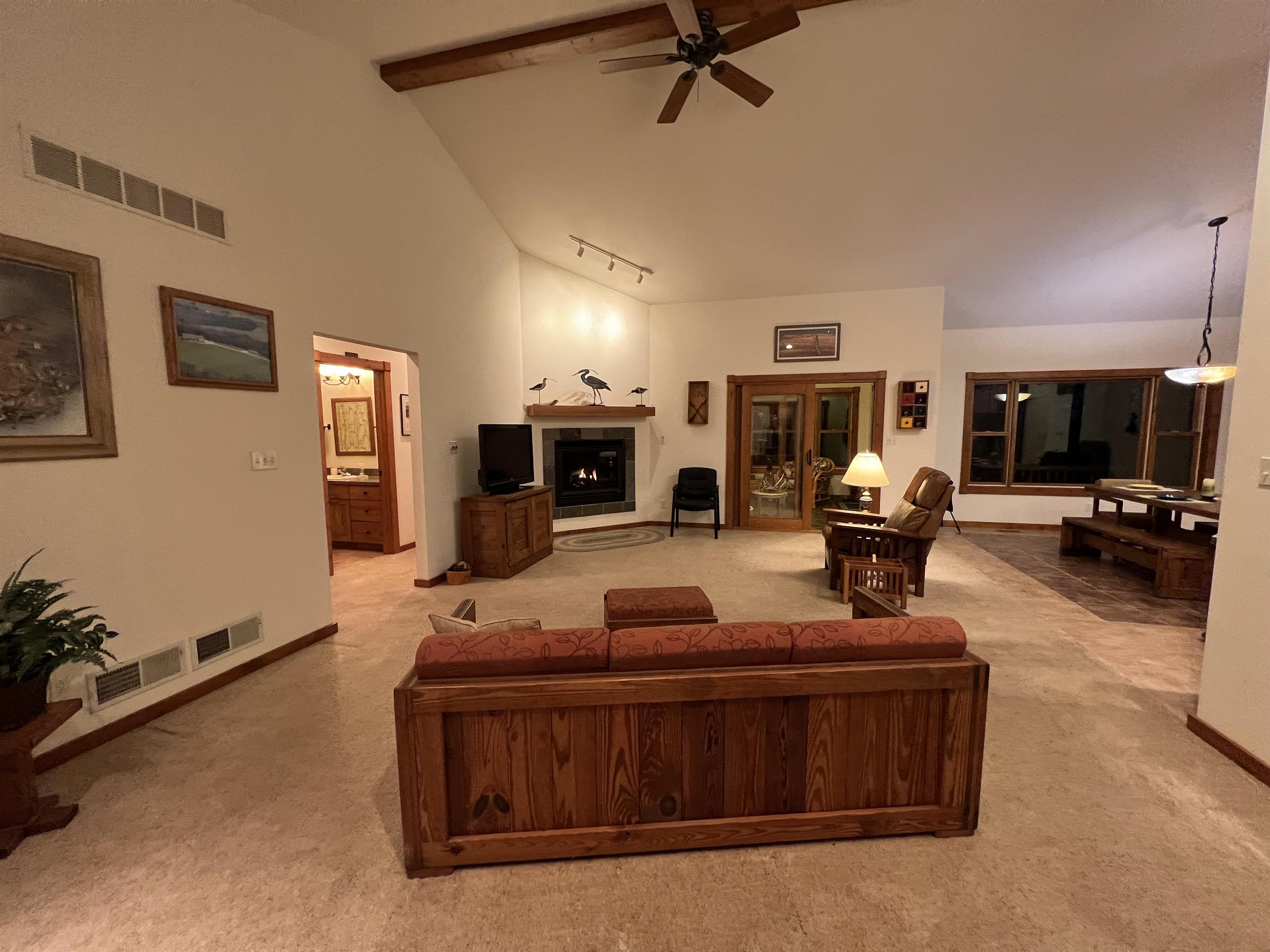 4707 South Elmoville Road Stockton, IL 61085 - Photo 11 of 43 a living room with furniture and a flat screen tv