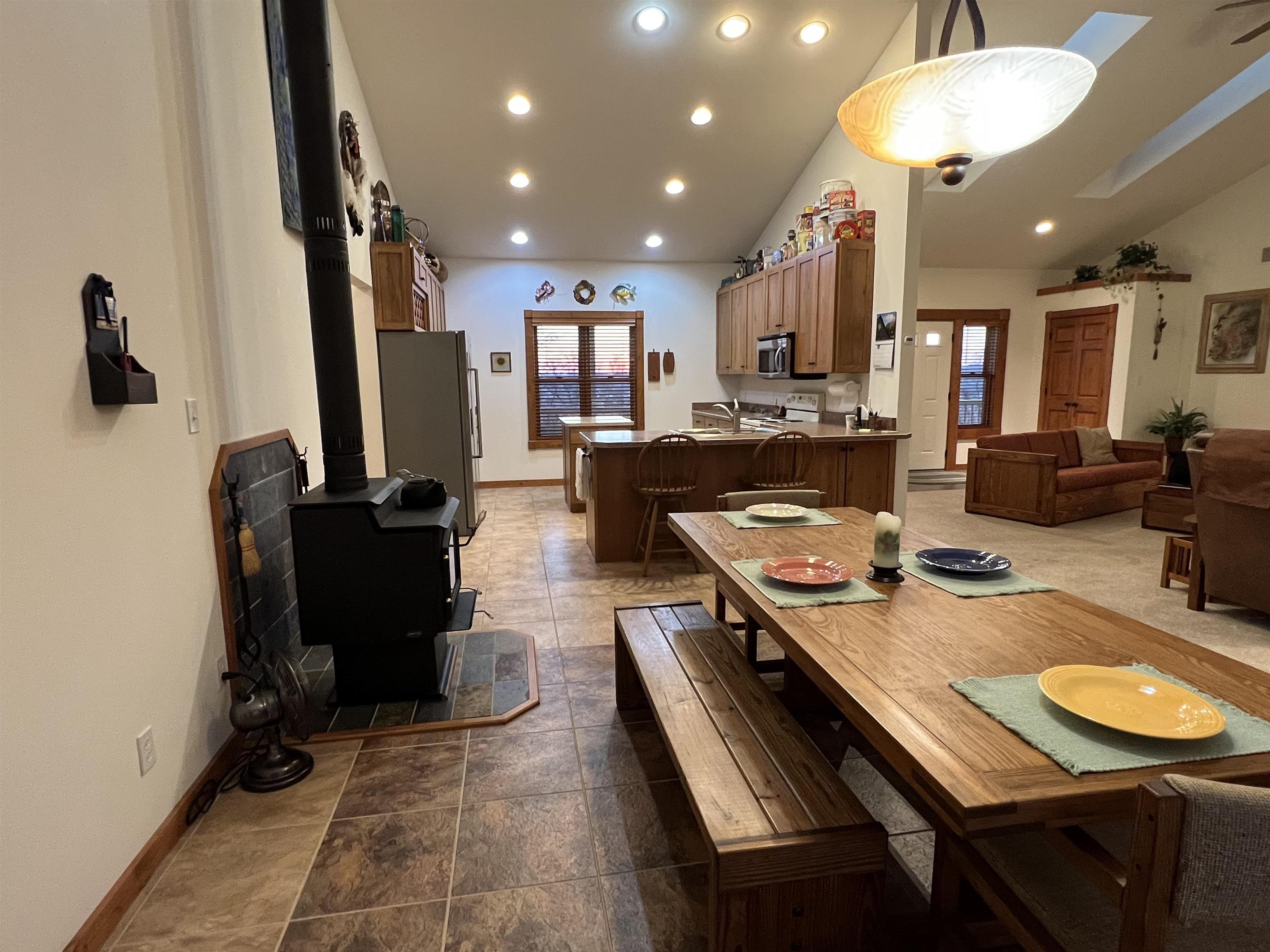 4707 South Elmoville Road Stockton, IL 61085 - Photo 17 of 43 a view of a dining room with furniture