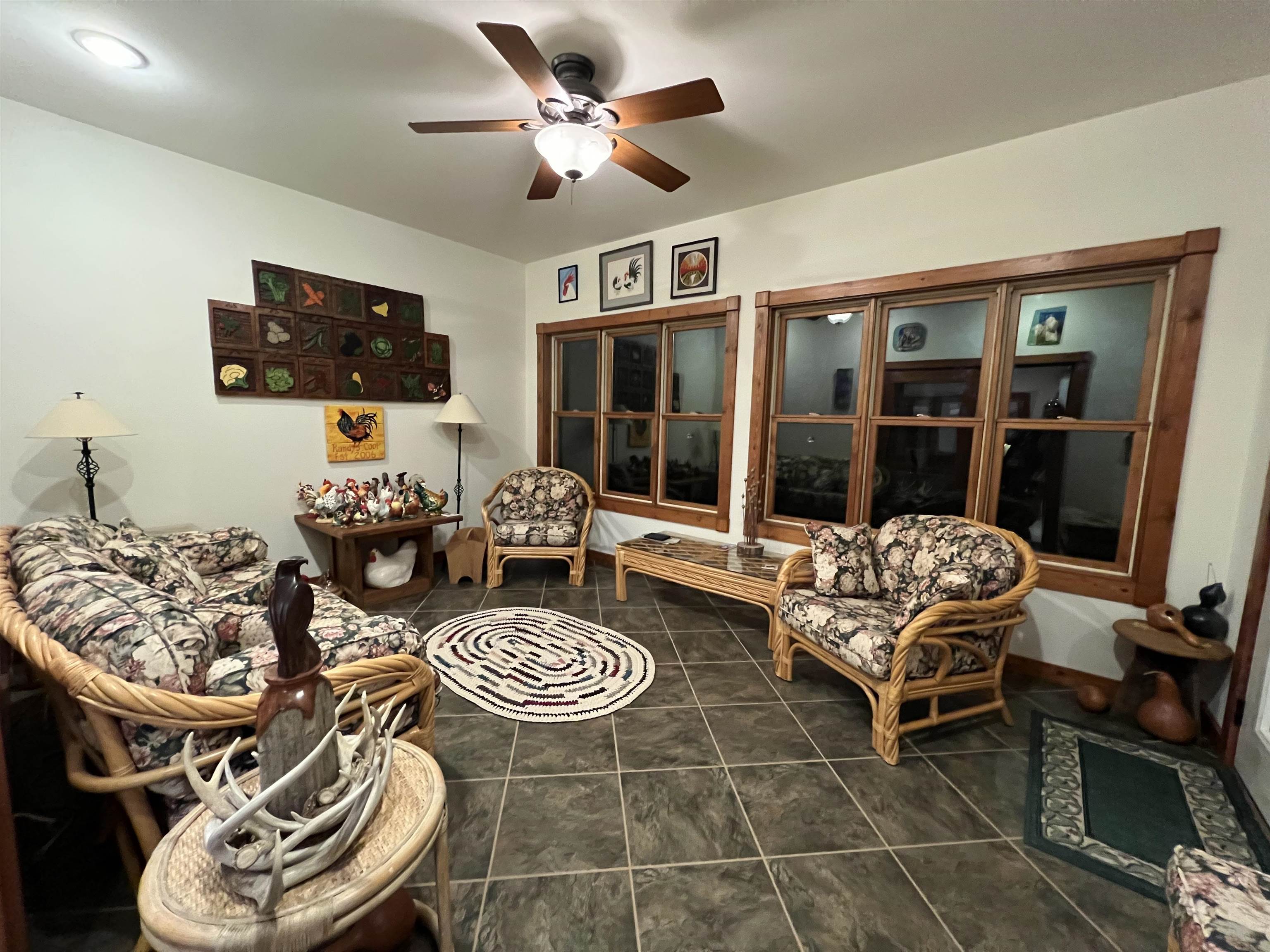 4707 South Elmoville Road Stockton, IL 61085 - Photo 20 of 43 a living room with furniture and a flat screen tv