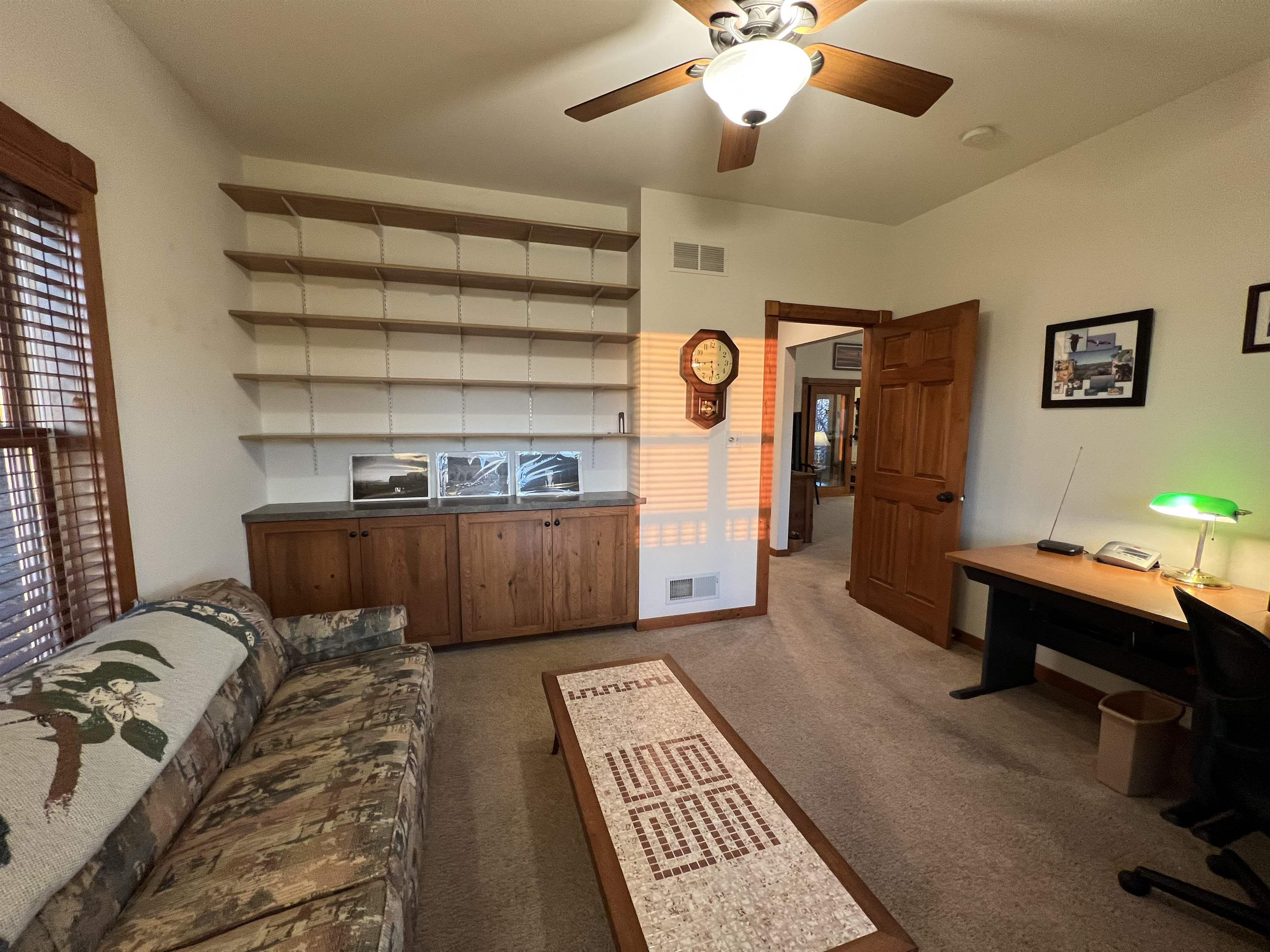4707 South Elmoville Road Stockton, IL 61085 - Photo 22 of 43 a living room with furniture and a flat screen tv