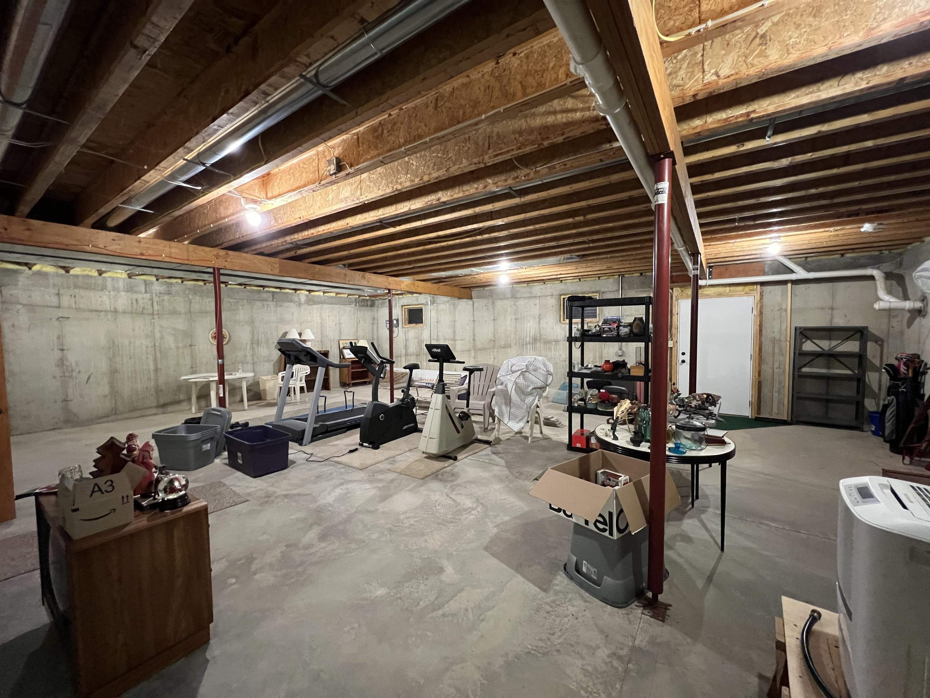 4707 South Elmoville Road Stockton, IL 61085 - Photo 34 of 43 a gym room with lots of chairs and couches