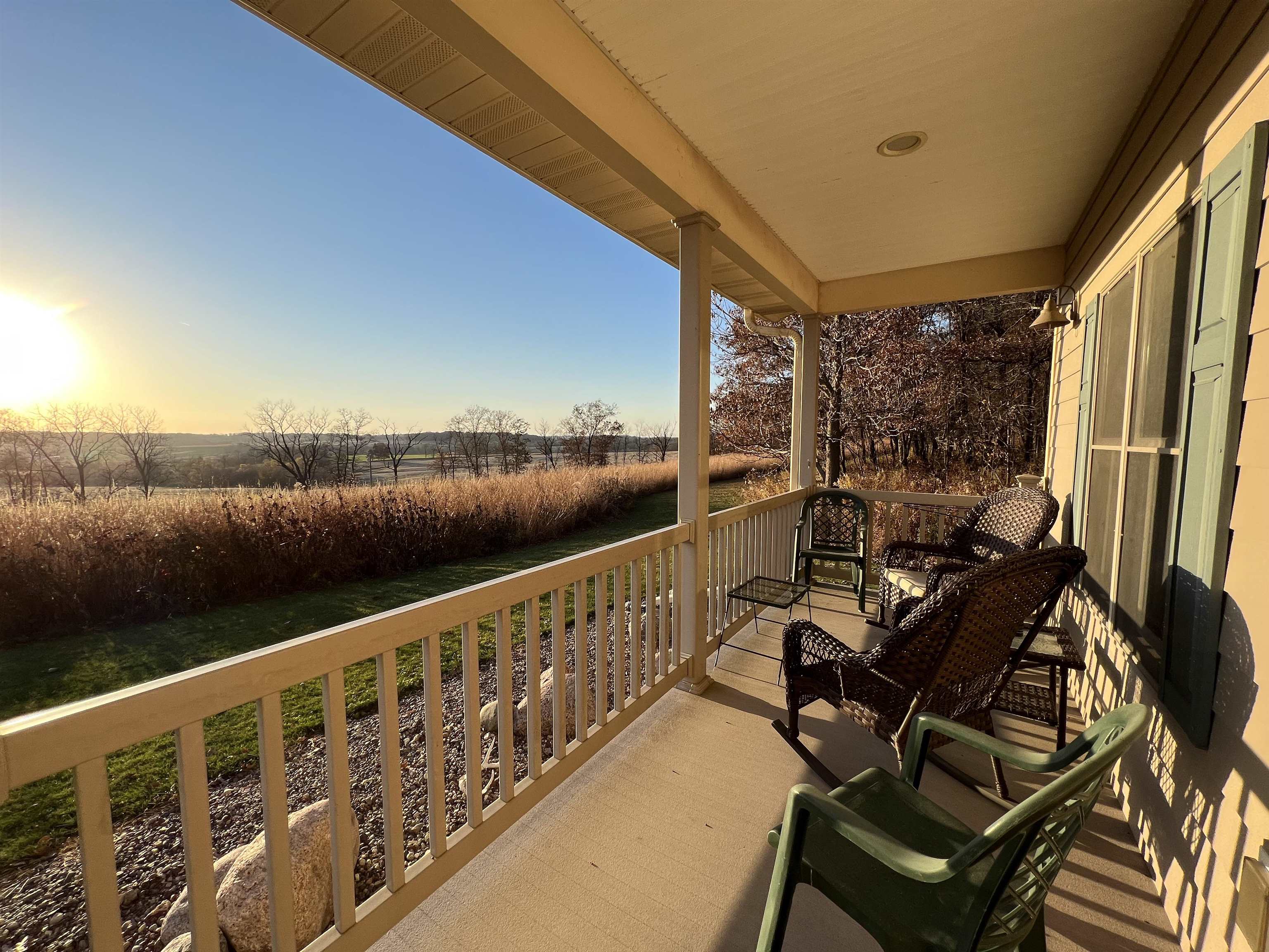 4707 South Elmoville Road Stockton, IL 61085 - Photo 8 of 43 a view of a balcony with chairs