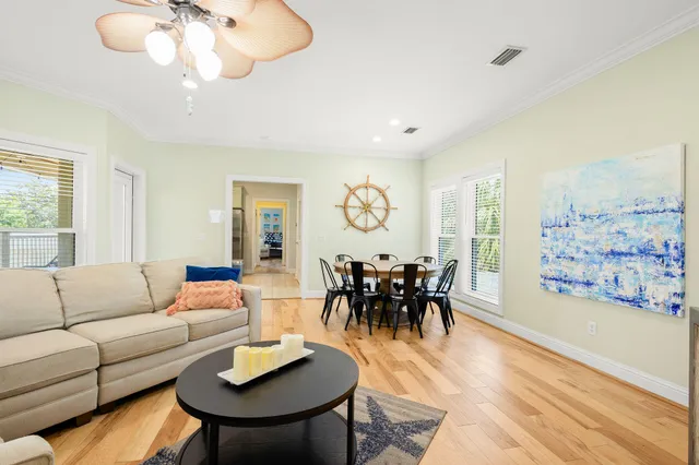 a balcony with furniture and flowers