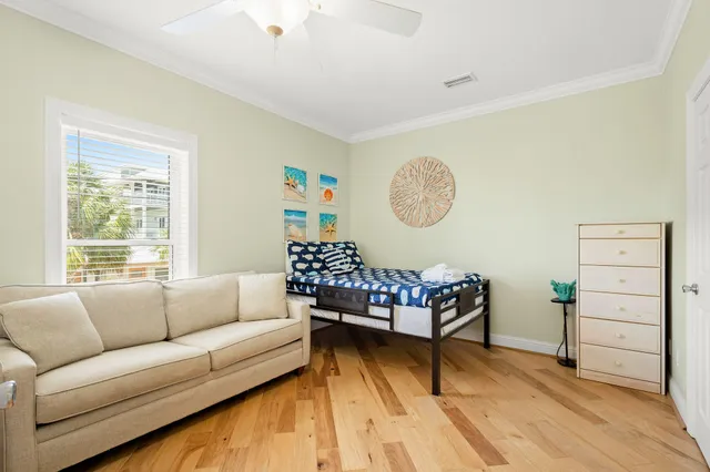 a bathroom with a sink a toilet and shower curtain