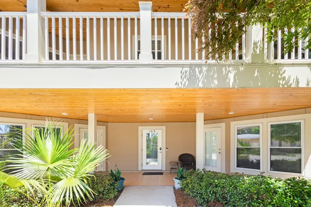 a view of a balcony with plants
