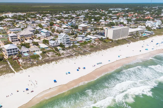 a view of a building with sitting area