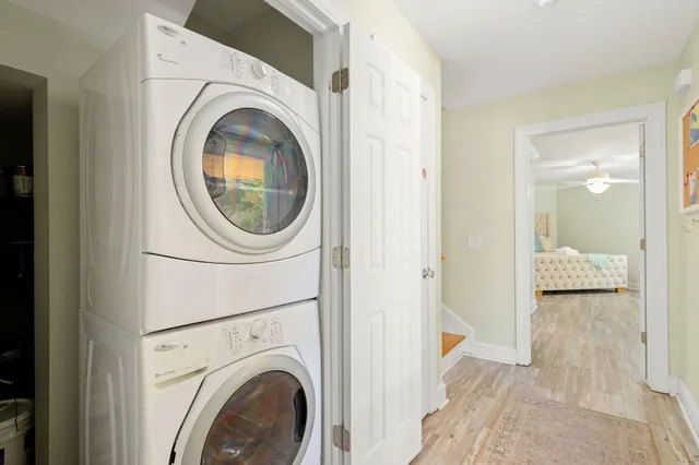 a view of a hallway with washer and dryer