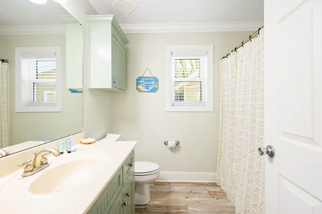 a view of window with wooden floor