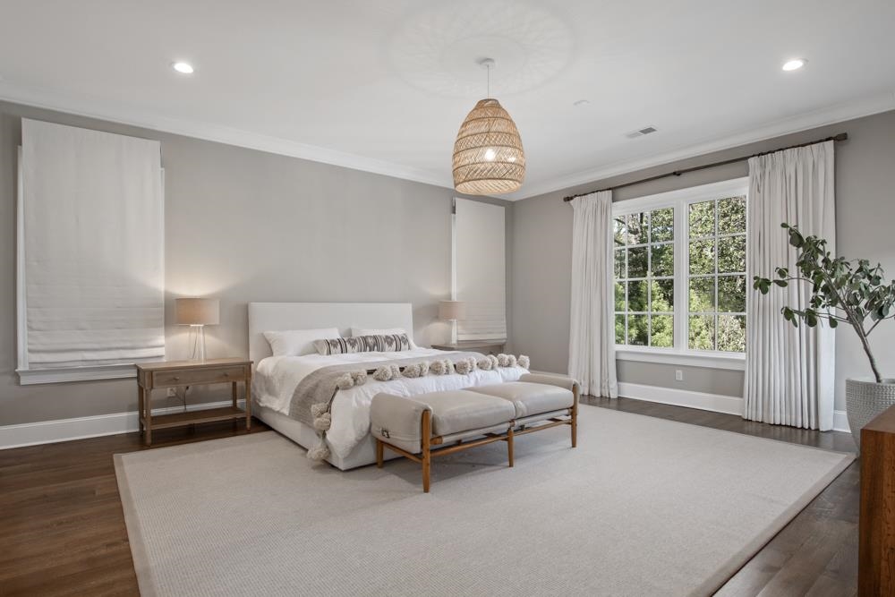 76 Waring Road Memphis, TN 38117 - Photo 16 of 25 a spacious bedroom with a bed and a large window