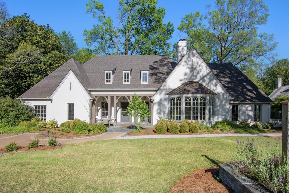 76 Waring Road Memphis, TN 38117 - Photo 2 of 25 front view of a house with a yard