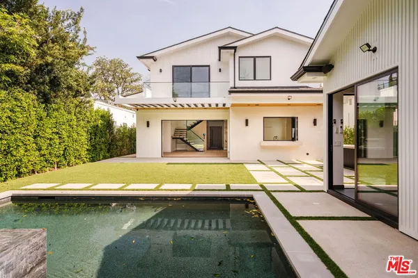 a house with river in front of it