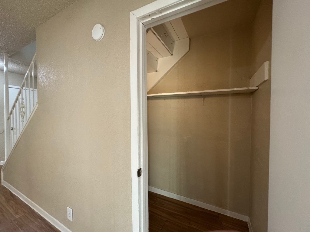 4902 West Wind Trail, Unit 104 Austin, TX 78745 - Photo 8 of 18 a view of closet