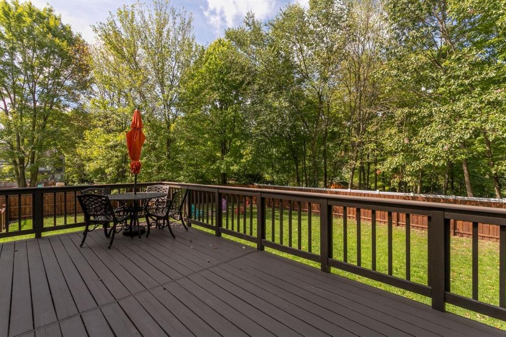 100 Shortcut Road Baden, PA 15005 - Photo 22 of 25 The 22x12ft. back deck is situated off of the kitchen. It features a retractible awning and it has recently been re-painted. You can access the back yard from the deck.