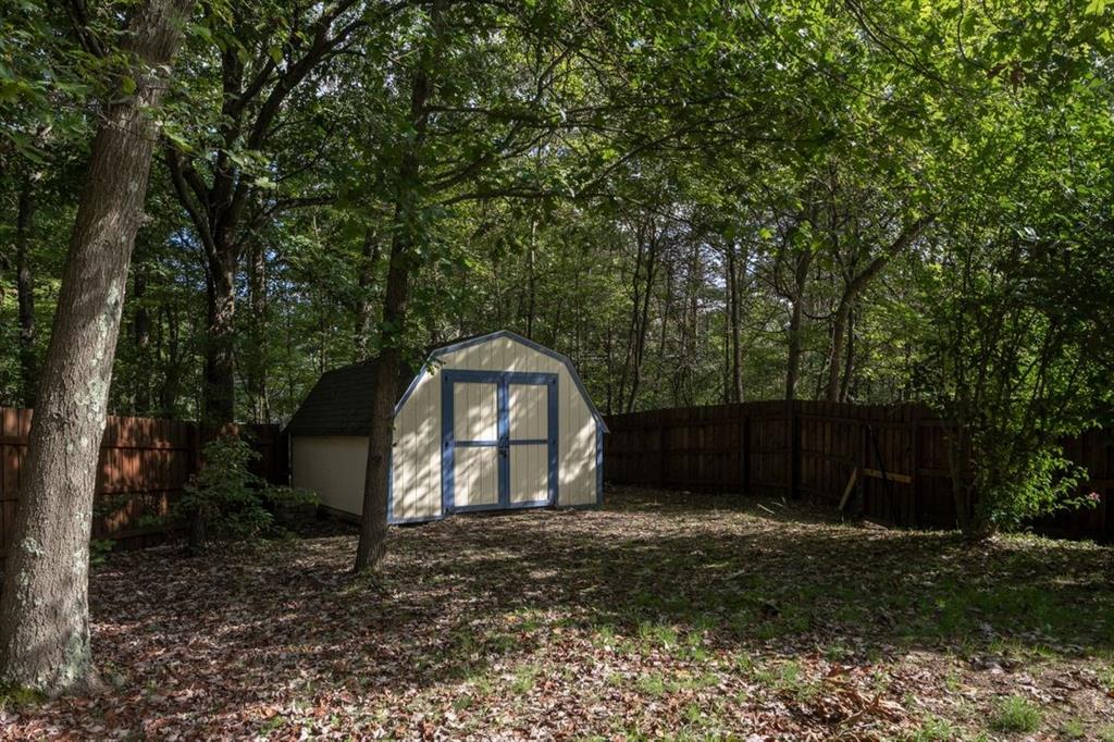 100 Shortcut Road Baden, PA 15005 - Photo 24 of 25 Storage shed in the far corner of the fenced back yard. The shed was re-painted this year.