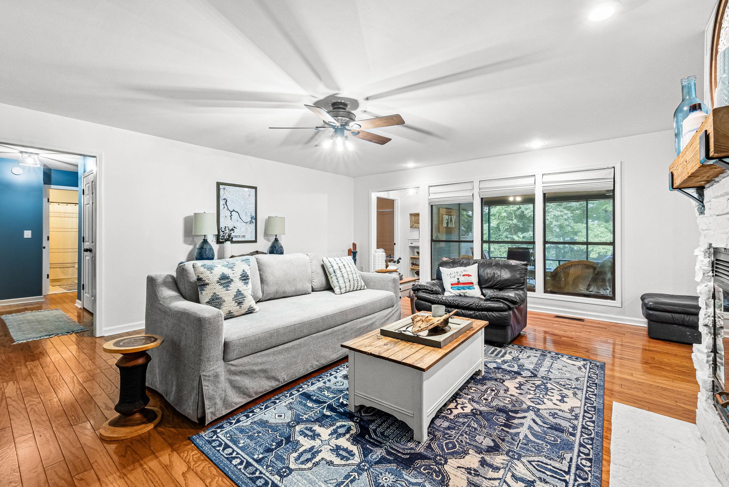 90 Roberts Drive Cherokee, MS 35616 - Photo 11 of 38 a living room with furniture a rug and a large window