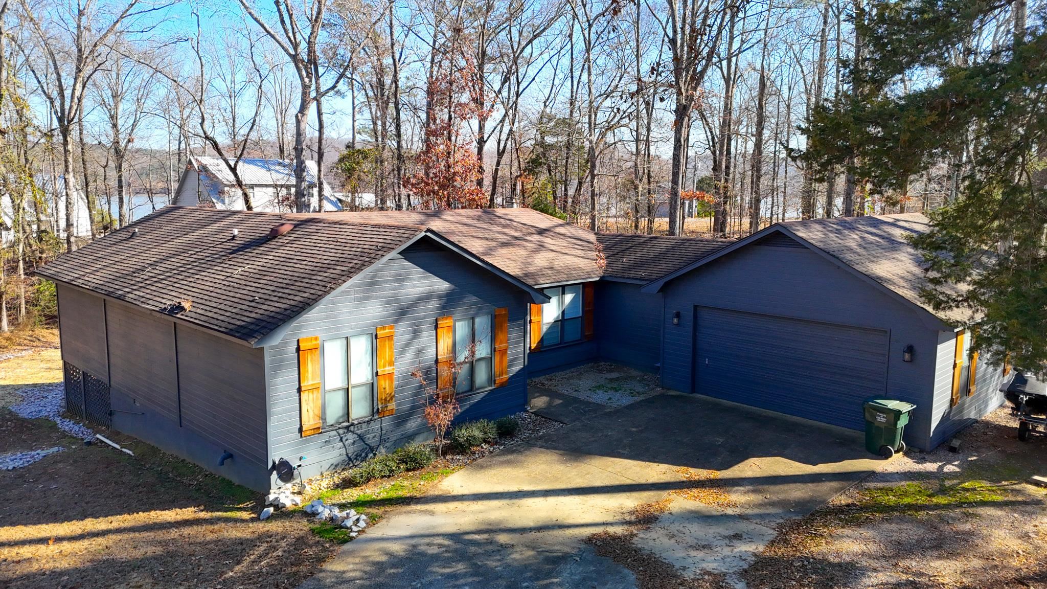 90 Roberts Drive Cherokee, MS 35616 - Photo 2 of 38 a view of a house with a yard chairs and wooden fence