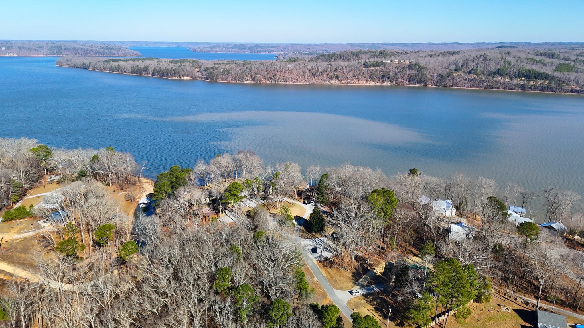 90 Roberts Drive Cherokee, MS 35616 - Photo 5 of 38 a view of a lake with a mountain in the background