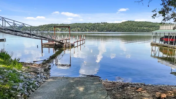 a view of a lake with a mountain in the background