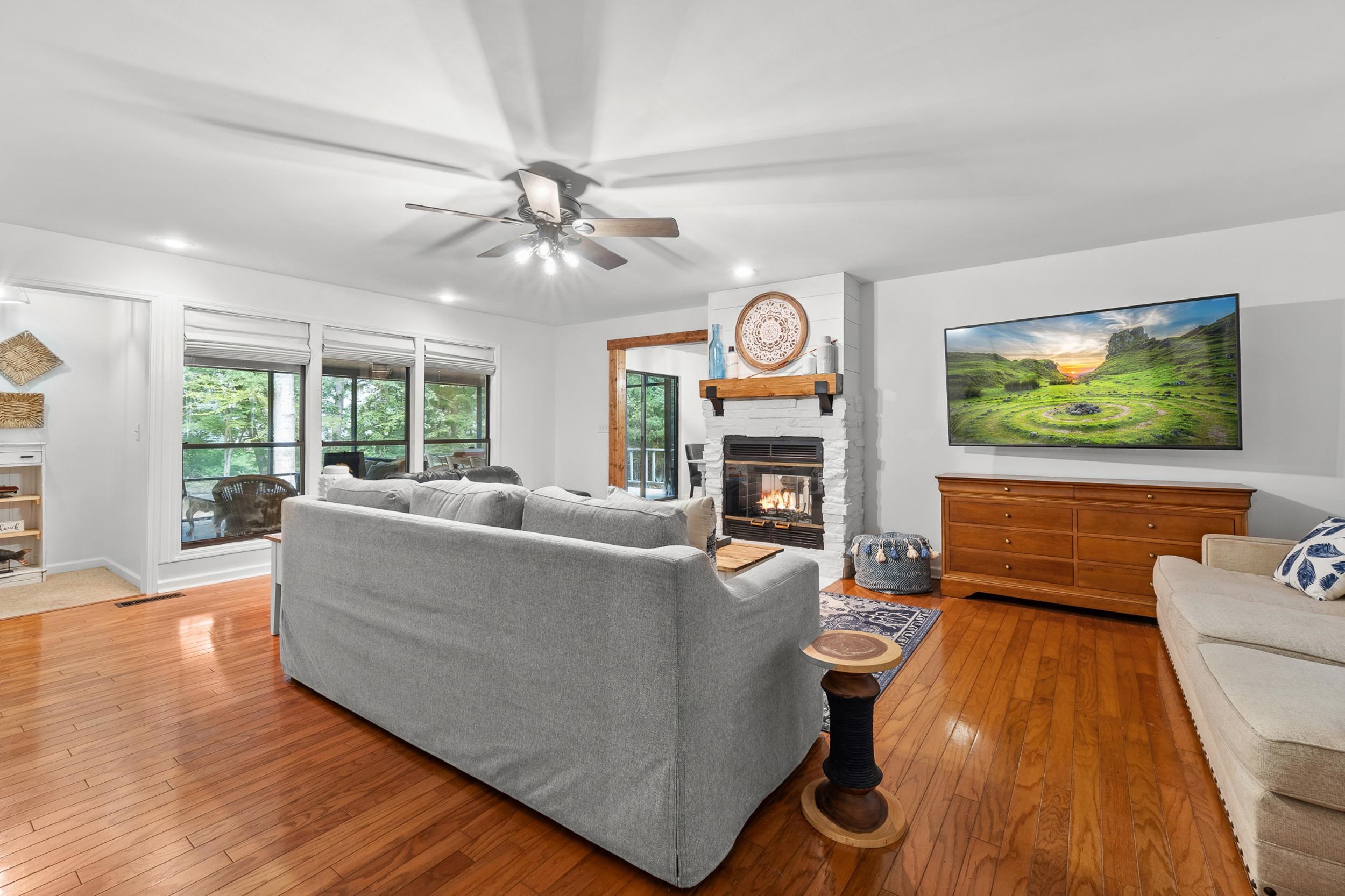 90 Roberts Drive Cherokee, MS 35616 - Photo 8 of 38 a living room with furniture and a flat screen tv