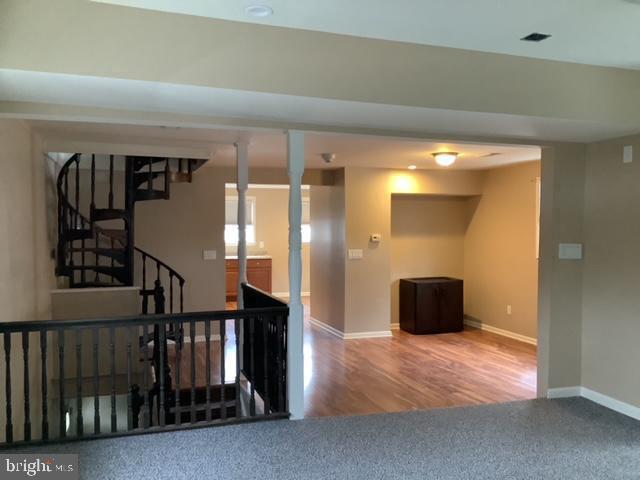 14 Broad Street, Unit 2 Florence, NJ 08518 - Photo 5 of 13 a view of a hallway with wooden floor and entryway