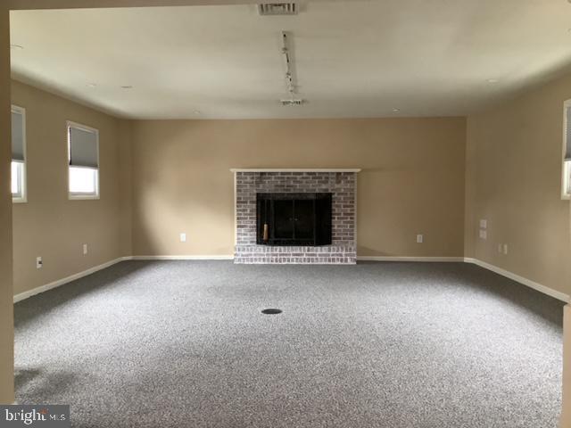 14 Broad Street, Unit 2 Florence, NJ 08518 - Photo 6 of 13 a view of empty room with a fireplace