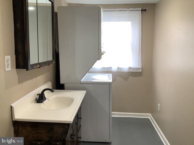 14 Broad Street, Unit 2 Florence, NJ 08518 - Photo 10 of 13 a bathroom with a sink and a mirror