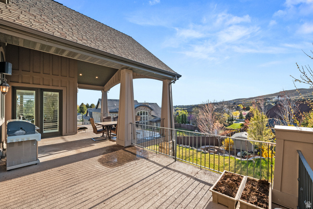1205 North Elk Rdg Lane, Unit 202 Alpine, UT 84004 - Photo 67 of 88 Expansive covered deck featuring recessed lighting, a ceiling fan, and access through double glass doors with interior shutters