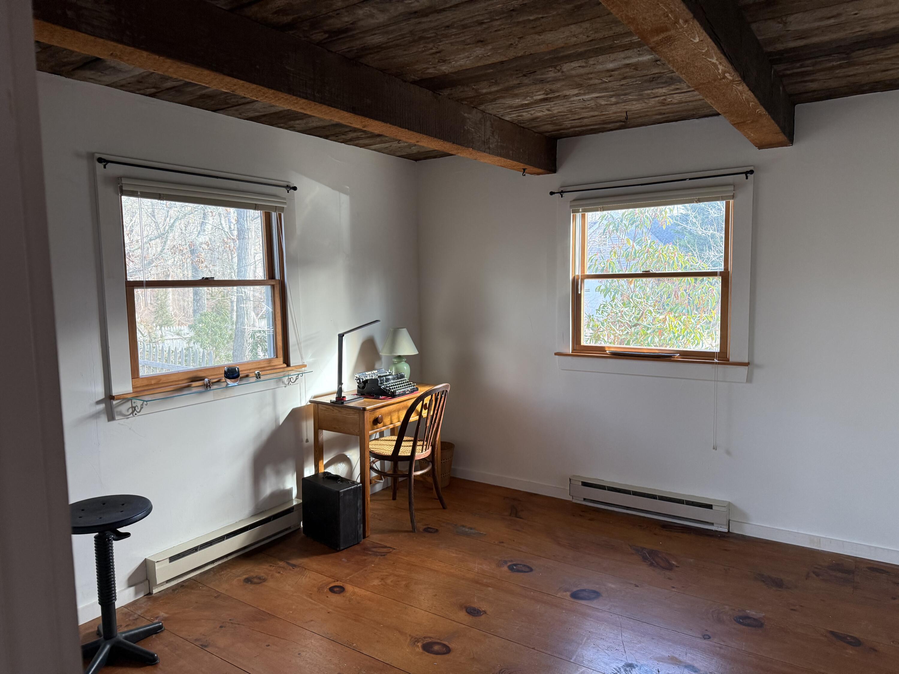 14 21st Street North Edgartown, MA 02539 - Photo 12 of 19 a bedroom with furniture and a window