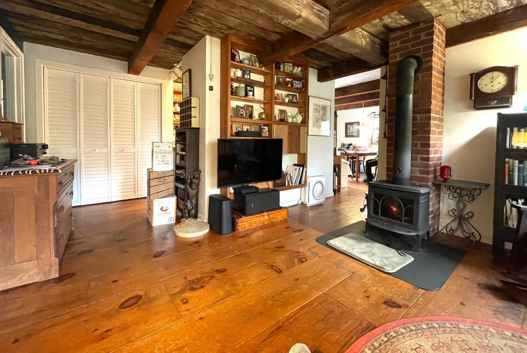 14 21st Street North Edgartown, MA 02539 - Photo 5 of 19 a living room with patio furniture and a flat screen tv