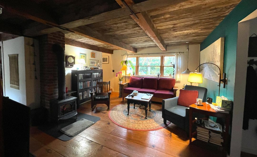 14 21st Street North Edgartown, MA 02539 - Photo 7 of 19 a living room with furniture fireplace and a table