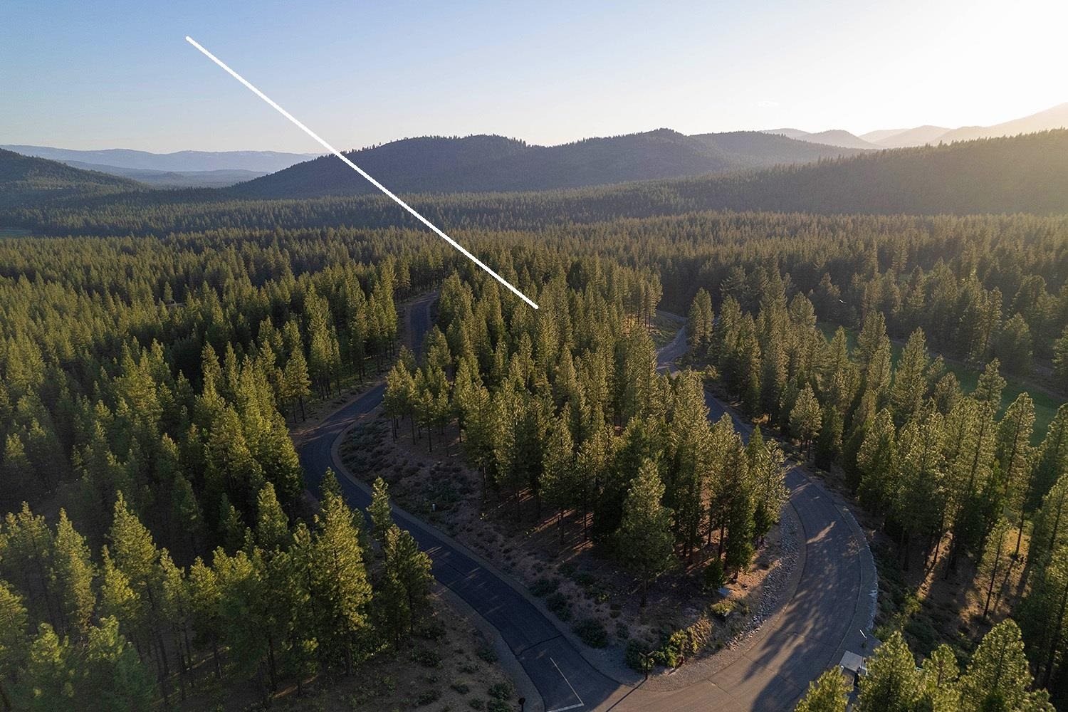 58 South Ridge Road Portola, CA 96122 - Photo 2 of 13 a view of a lake with a mountain in the background