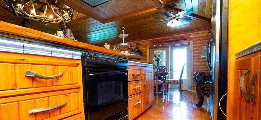 13255 Highway 441 Okeechobee, FL 34974 - Photo 13 of 29 a view of outdoor space with wooden floor and a sink