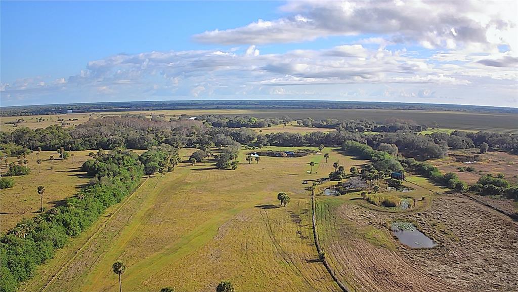 13255 Highway 441 Okeechobee, FL 34974 - Photo 25 of 29 a view of a lake with a city