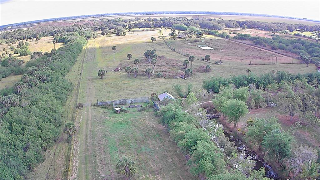 13255 Highway 441 Okeechobee, FL 34974 - Photo 26 of 29 a view of lake with mountain