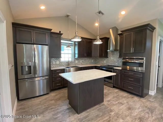 a bathroom with a sink double vanity and a mirror