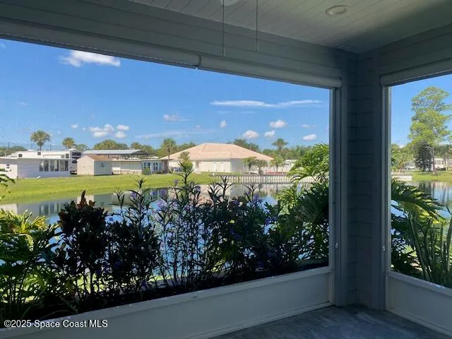a view of outdoor space with signage and flags