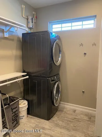 a view of a swimming pool with a lake view and mountain view