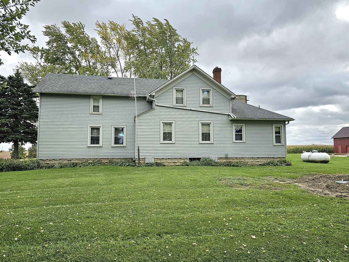 22132 Ridgeland Avenue Matteson, IL 60443 - Photo 8 of 11 a front view of a house with a garden