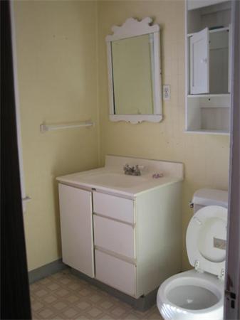 17 Tallawanda Drive Worcester, MA 01603 - Photo 15 of 20 a bathroom with a toilet sink and mirror