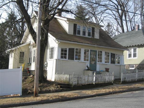 17 Tallawanda Drive Worcester, MA 01603 - Photo 16 of 20 a front view of a house with a garden