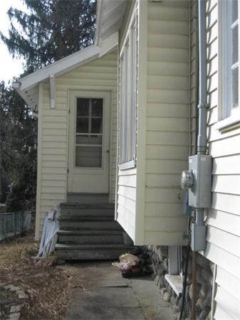 17 Tallawanda Drive Worcester, MA 01603 - Photo 19 of 20 a front view of a house with a yard